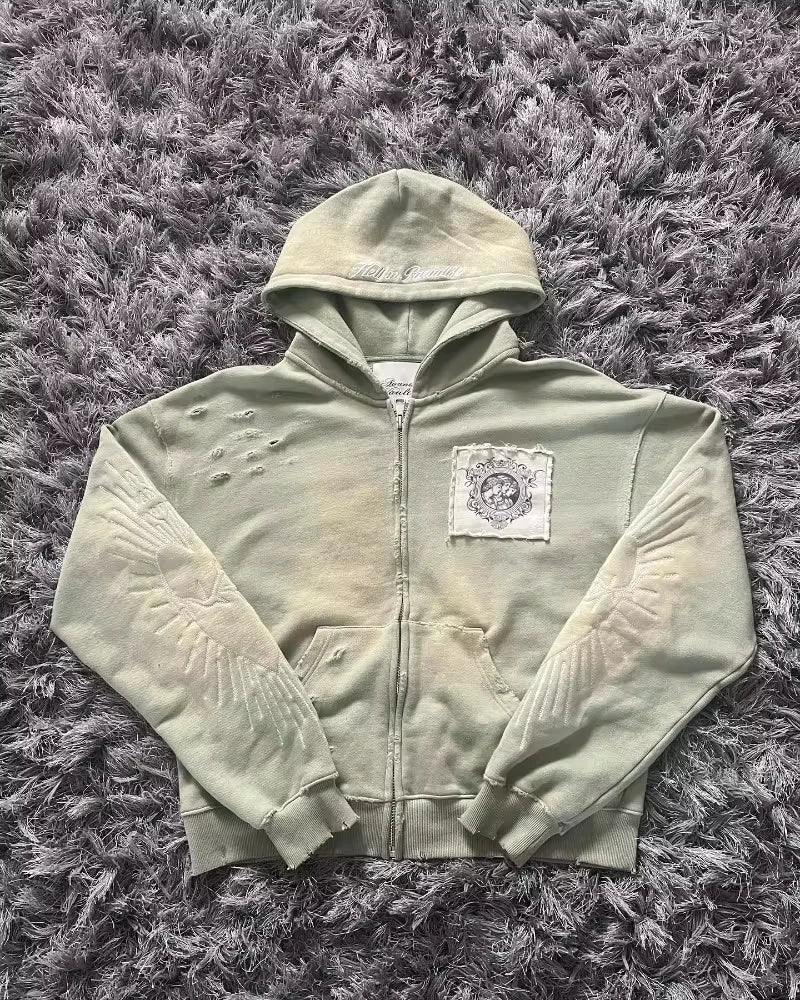 Noxwear Anime Hoodies in light green featuring zip‑up front, chest pockets with flap detail, and sleeve patch accent for oversized streetwear style.