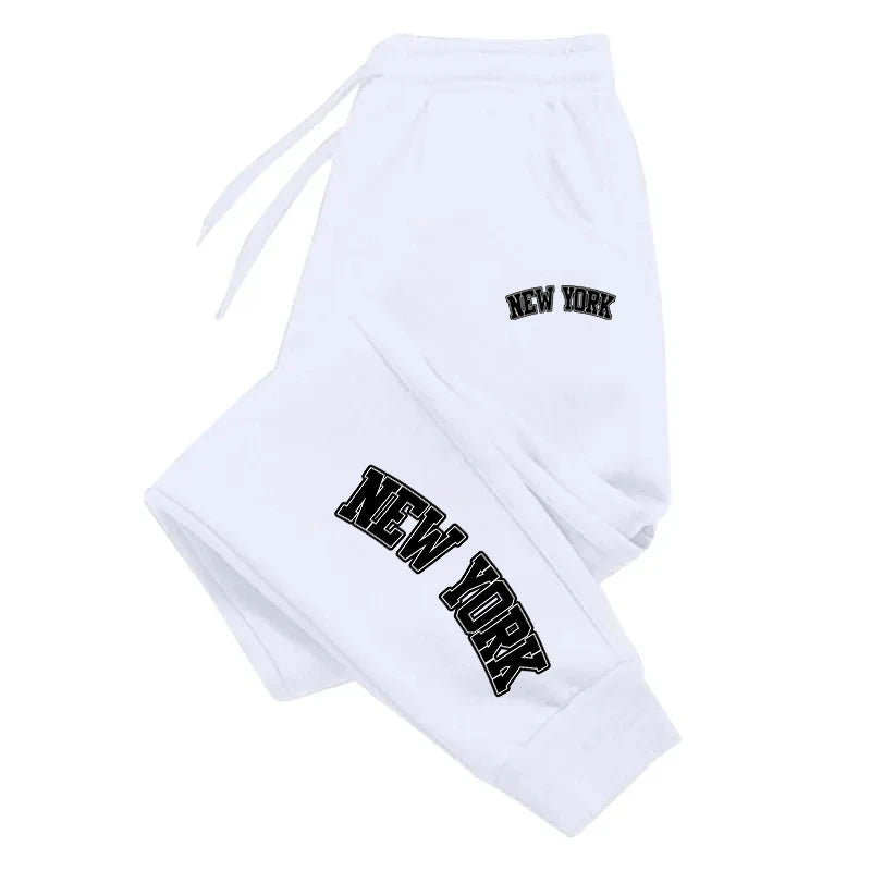 Men’s casual sweatpants in white with black logo print, featuring drawstring waist for comfort and sporty style.