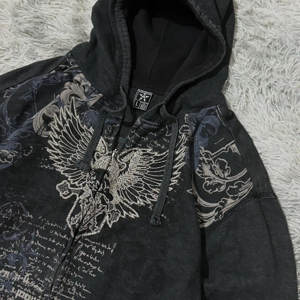 Noxwear Anime Hoodies featuring a black zip-up design with intricate graphic details and Gothic elements.