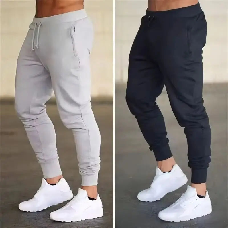 Men’s Sports Jogger Pants in grey and black, showcasing athletic fit and modern style for comfort and performance.