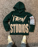 Noxwear Anime Hoodies in dark green featuring bold FEAR STUDIOS back print, sleeve patch detail, and oversized streetwear fit.