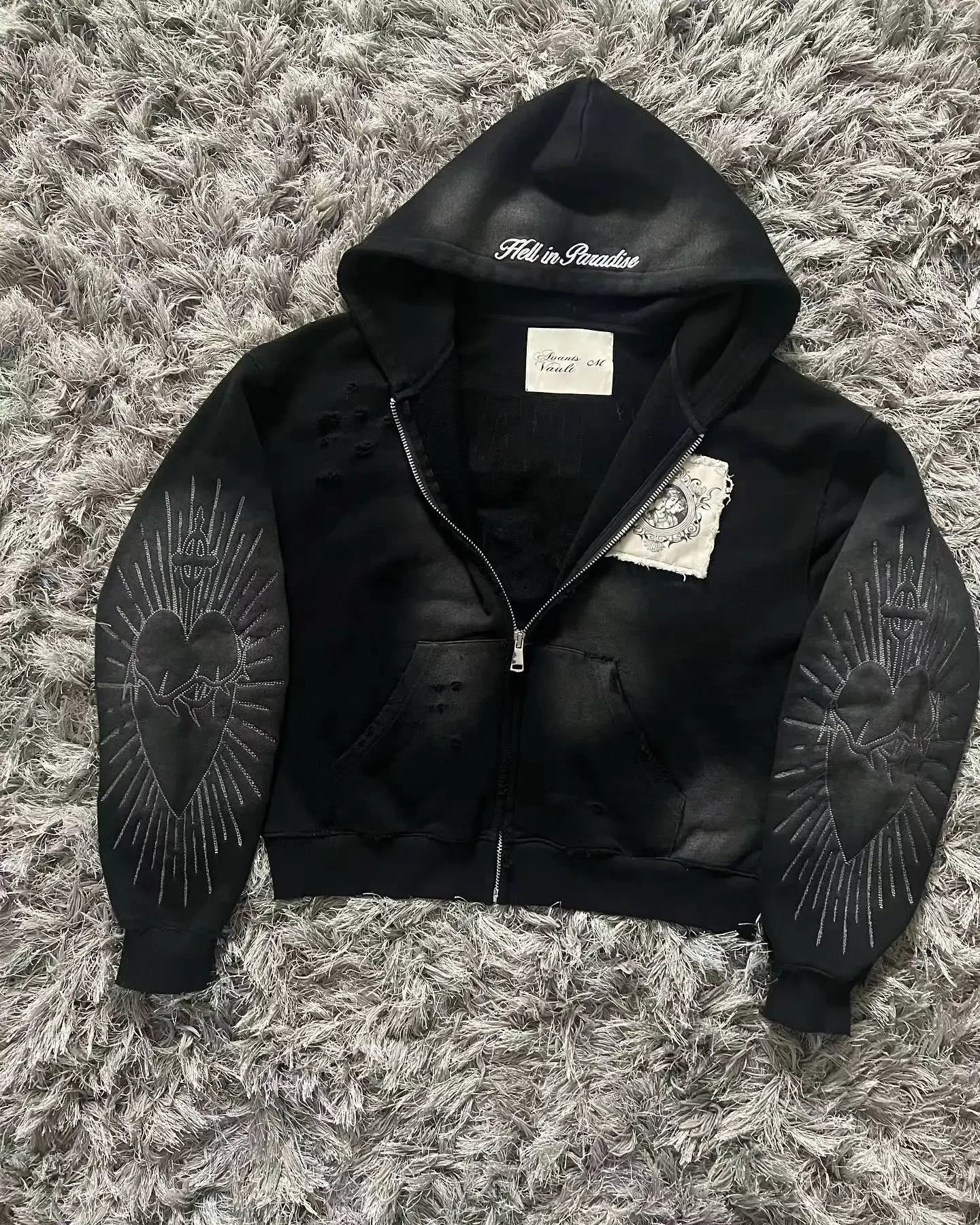 Noxwear Anime Hoodies in black featuring cropped shiny faux‑leather design with zip‑up front for bold streetwear style.