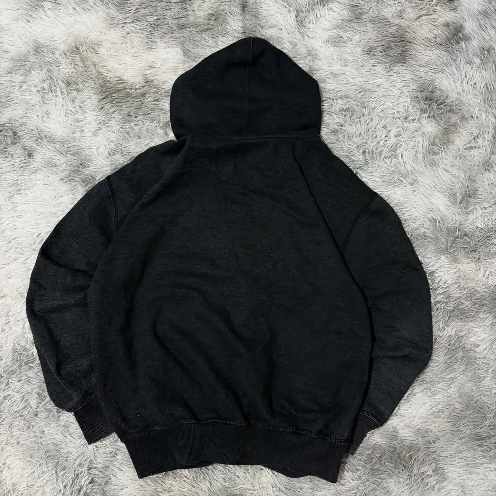 Noxwear Anime Hoodies featuring a black oversized design with soft fabric texture and marbled hood pattern for bold streetwear style.