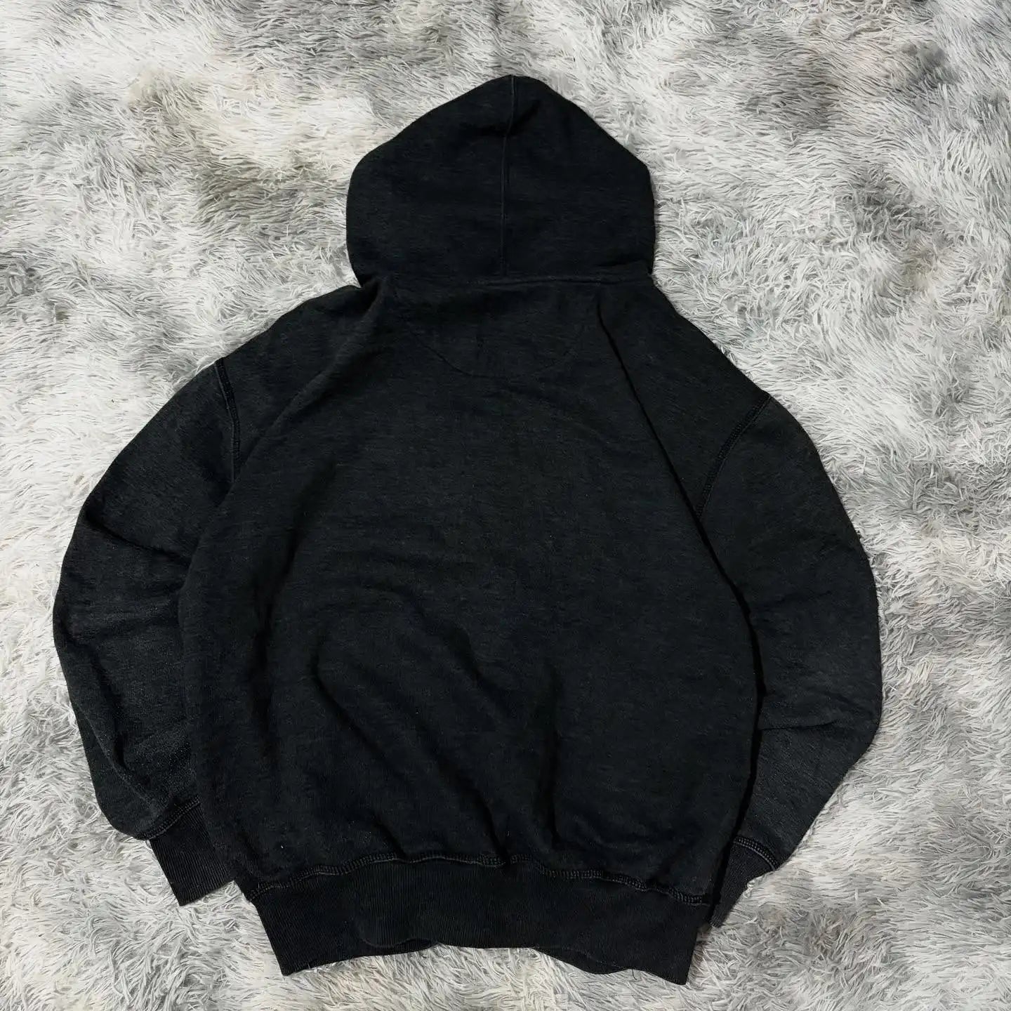 Noxwear Anime Hoodies featuring a black oversized design with soft fabric texture and marbled hood pattern for bold streetwear style.