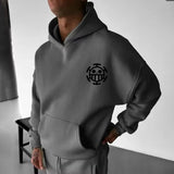 Men’s hooded sweatshirt in gray with black chest graphic print, featuring cotton fabric for comfort and casual streetwear style.