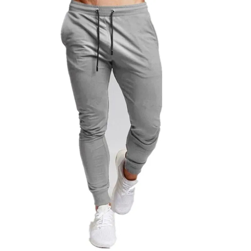 Men’s casual jogger sweatpants in grey, ideal for comfort and style during workouts or casual outings.